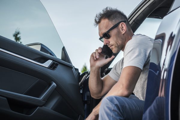 Driver Making Emergency Call From His Car